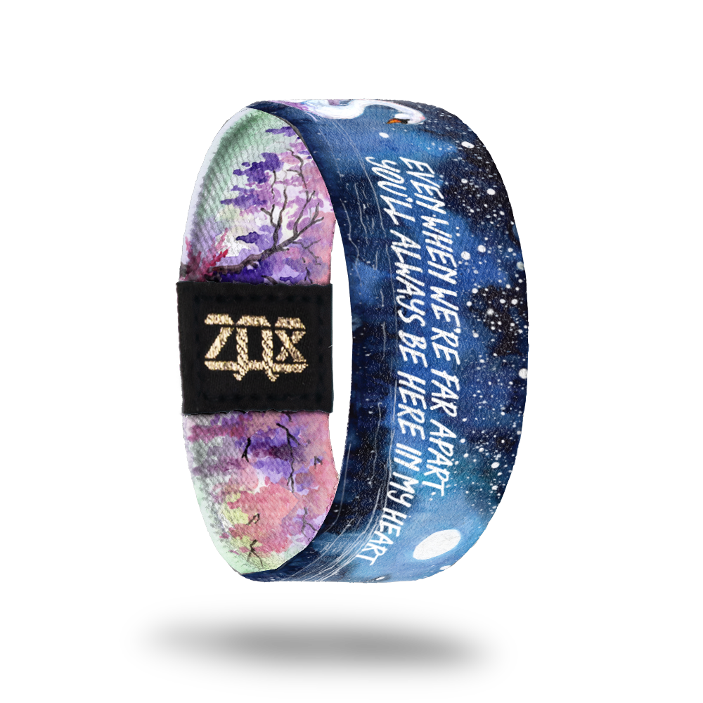Inside Design of Even When We’re Far Apart: watercolor night sky with a swan swimming in the water and white text in the middle ‘Even when we’re far apart you’ll always be here in my heart’