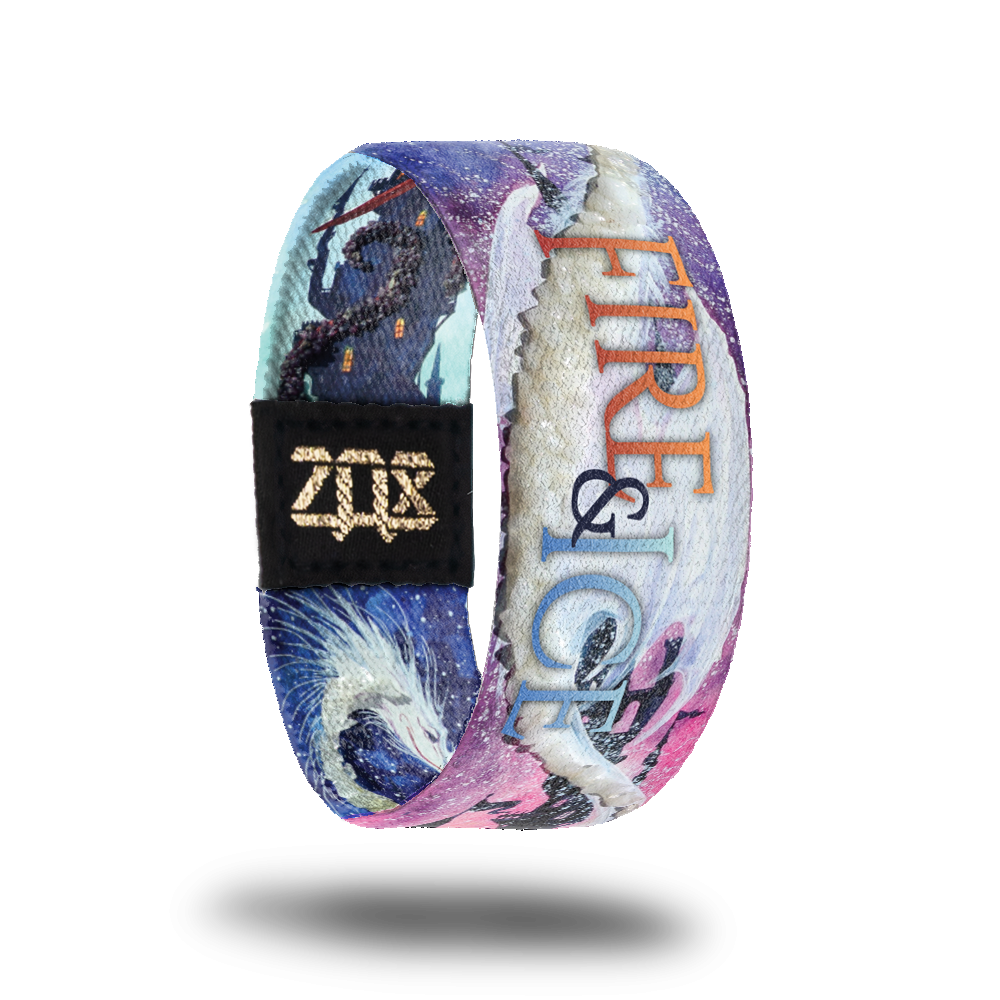 Inside design of Fire & Ice. Centered is fire in red text, the and symbol is black text, and ice in a light blue text. Background is light pink and light purple with an illustrated white dragon