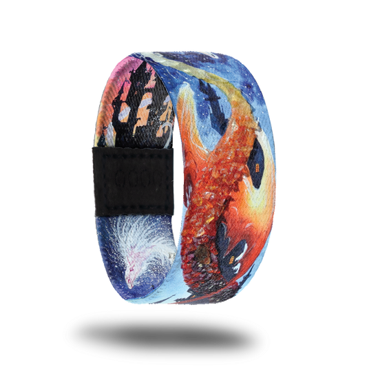 Outside design of Fire & Ice. A blended background of red and blue with an illustrated dragon across the design with a white-blue head and a red body