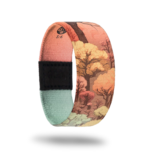 Outside is a forest with trees all over in the muted colors of pink, green, yellow and orange. 