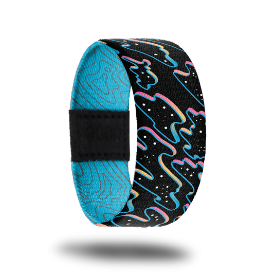 Outside design of Let Go. Black background with neon pink, blue, and yellow outlined paint puddles with black and white dots in the puddle shapes