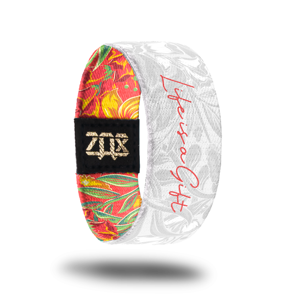 Inside design of Life Is A Gift. Same design as the outside but in soft white and gray. Life Is A Gift is centered on the design in an orange-red thin text