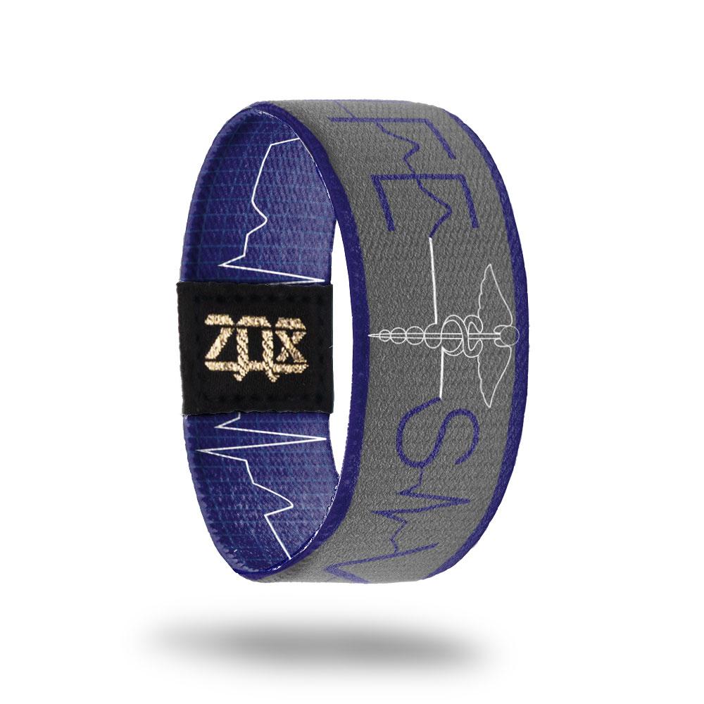 Inside design of Life Saver. Background is grey with a blue boarder on the top and bottom. Life Saver text designed to look like it came from a heart monitor. At the center in a white outline is the caduceus staff symbol 