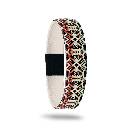 Outside Design of Never Surrender: tan, red, yellow, and green tribal design