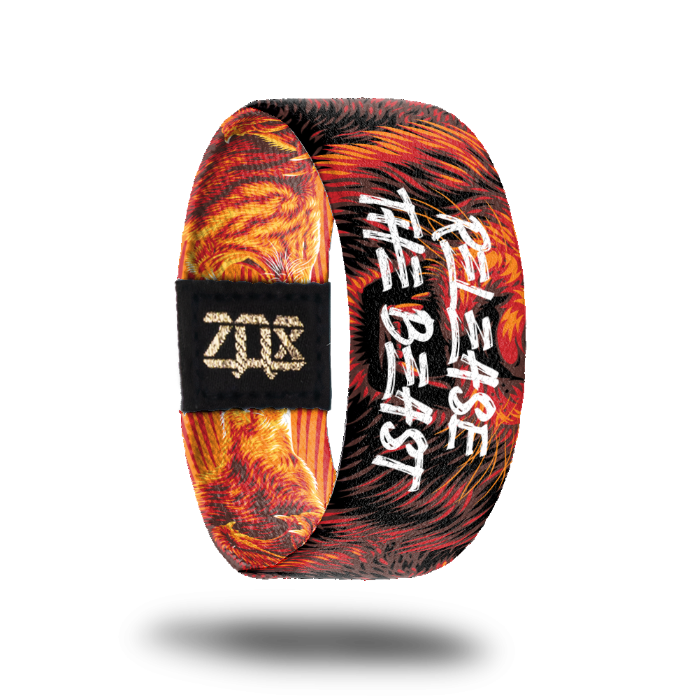 Inside design for Release The Beast. Red-orange with a zoomed in look of the drawn lion head roaring and Release The Beast in white text over the face in the center