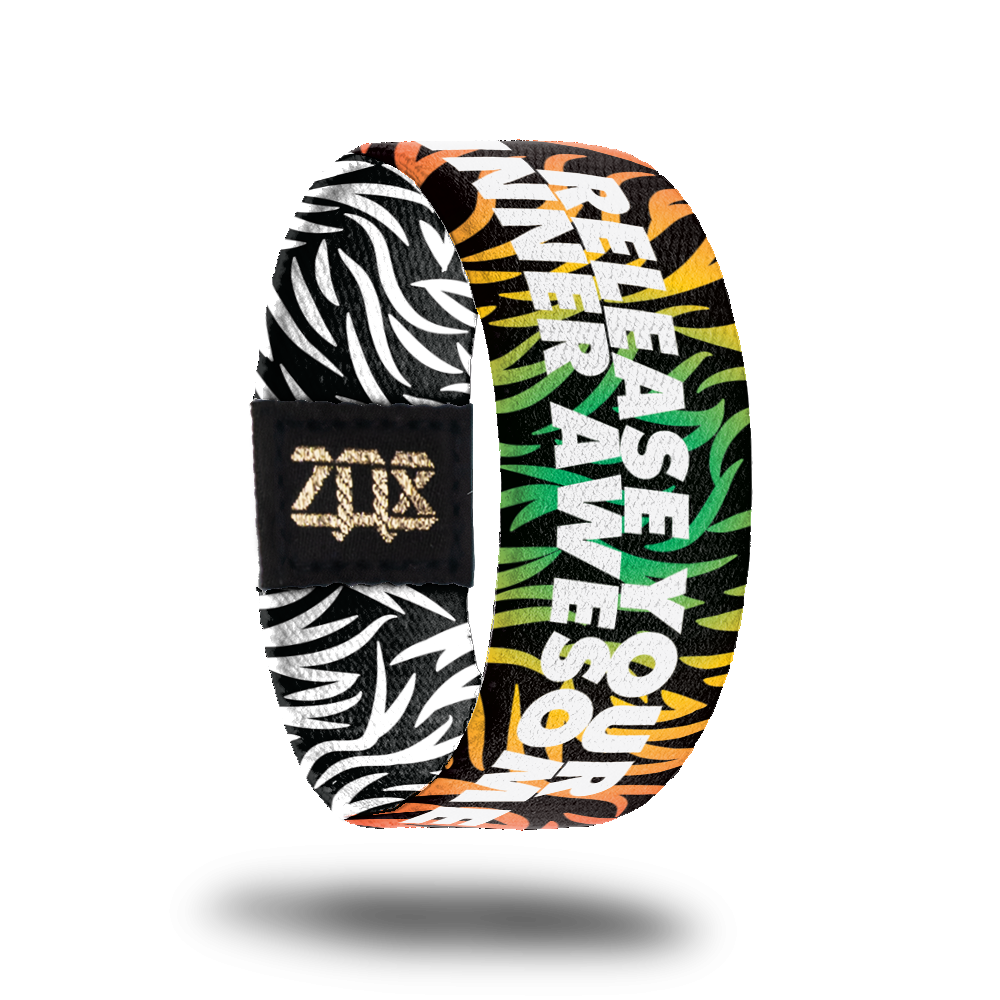 Inside design for Release Your Inner Awesome. Black background with blended colors of orange, yellow, and green as wavy and zig-zag shapes. Centered is Release Your Inner Awesome in large white text 