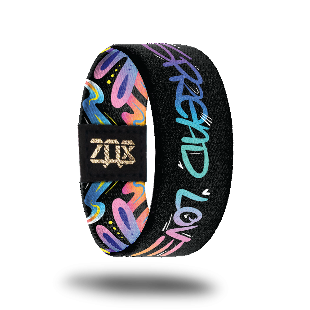 Inside design for Spread Love. Black background with Spread Love in blended colors 