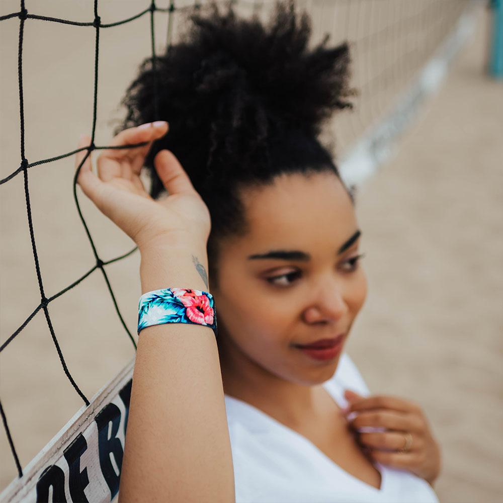 Lifestyle image of someone resting against a volleyball net and wearing Try Again Tomorrow 