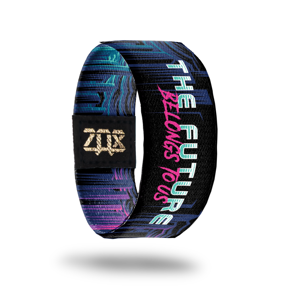 Inside Product image of elastic wristband called The Future Belongs To Us. The design is name of the wristband in a blue and pink font with a light blue and pink background on the sides with darker colors in the middle and behind the font.
