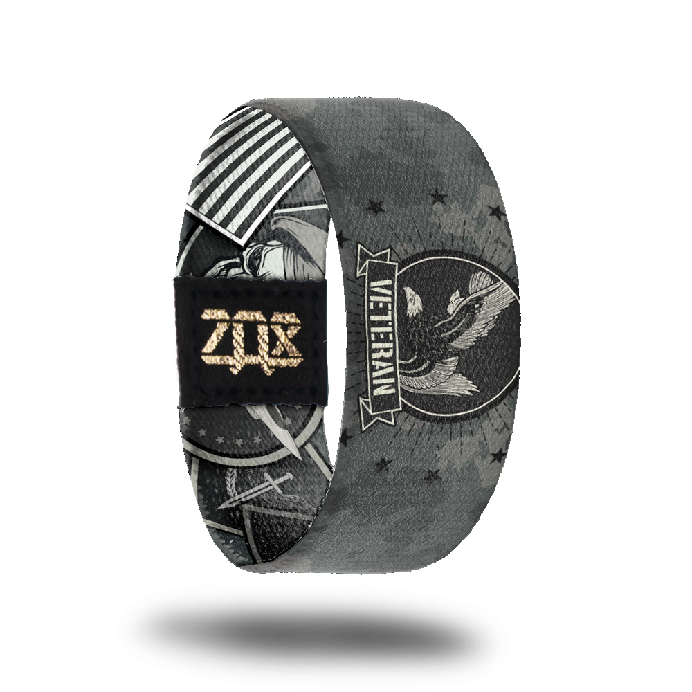 product photo of the inside design of a wristband made for Veterans, the design features various symbols used for branches of the military